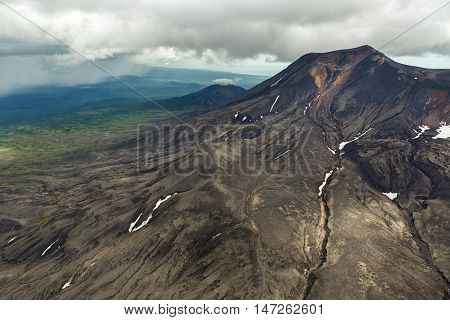 Maly Semyachik is a stratovolcano. Kronotsky Nature Reserve on Kamchatka Peninsula. View from helicopter.
