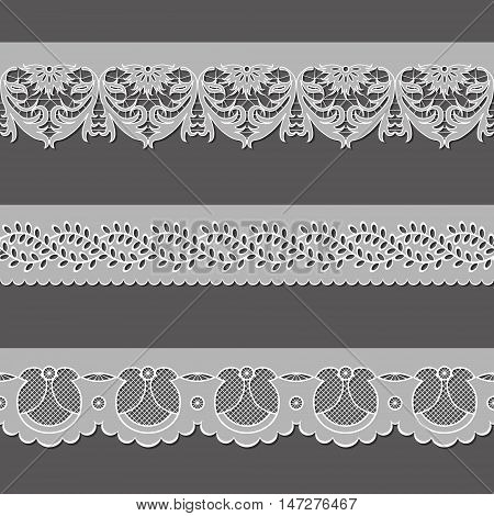 set of ribbons embroidered cutwork on a gray background