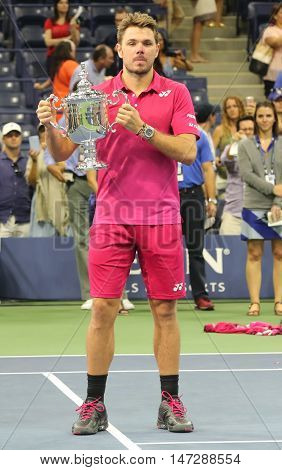 NEW YORK - SEPTEMBER 11, 2016: Three times Grand Slam champion Stanislas Wawrinka of Switzerland during trophy presentation after his victory at US Open 2016 final match at National Tennis Center