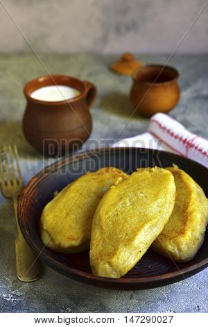 Fried Zeppelin (cepelinai) - Tradishional Lithuanian Potato Patty Stuffed With Meat.