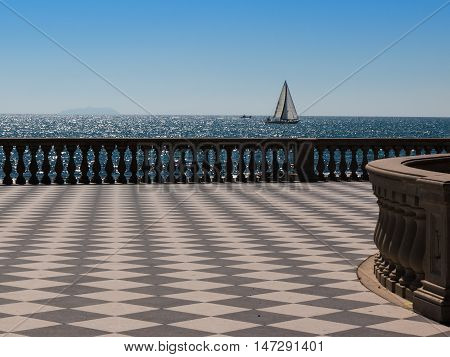 Livorno' s Mascagni Terrace and White Sailing Boat in Background Tuscany - Italy