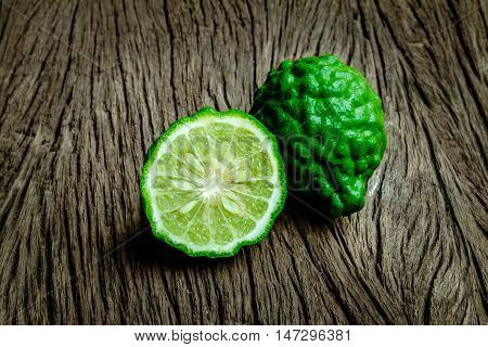 Close up bergamot on wooden table background (Kaffir lime)