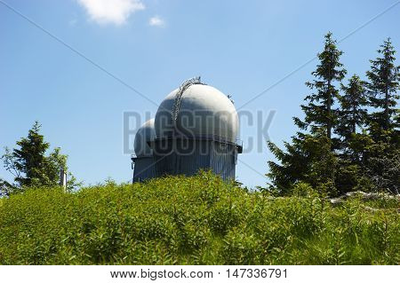 GROSSER ARBER, GERMANY - JUNE 16 2013: NATO distant early warning, high-resolution radar on 1456 m high peak in Bayerische Wald. National park in Bavaria.