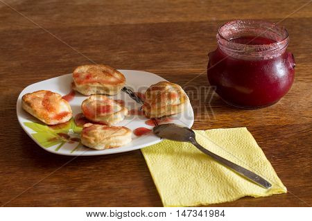 Olady - traditional ukrainian pancakes with strawberry jam.