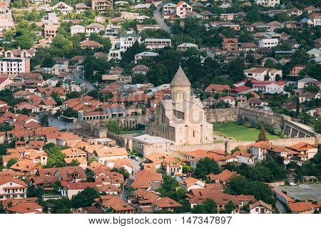 Mtskheta, Georgia. Top View Of The Svetitskhoveli Cathedral Of The Living Pillar, Georgian Orthodox Church, Unesco Heritage. The Sityscape Of Historic Old Town With Tile Roofs.