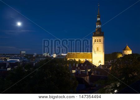 Summer night over Tallinn. A view of the Niguliste Church