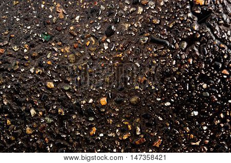 Asphalt, asphalt texture, real asphalt texture background, scabrous asphalt background, grainy street detail gray textured background, seamless asphalt background, closeup, wet road, wet asphalt