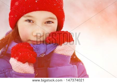 portrait of a teen girl on a walk in the winter. teen outdoors