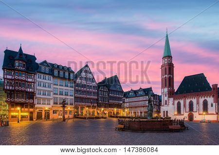 Old town square romerberg with Justitia statue in Frankfurt Germany. Historic center of Frankfurt at dusk