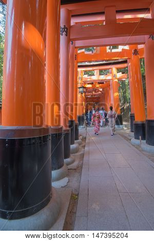 KYOTO, JAPAN - APRIL 30 , 2016 : Torii gates in Fushimi Inari Shrine, Kyoto, Japan. APRIL 30 2016. walkway in Torii gates.