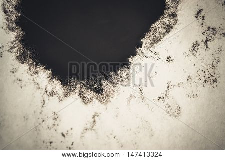 deliquescent ink blot on a white background