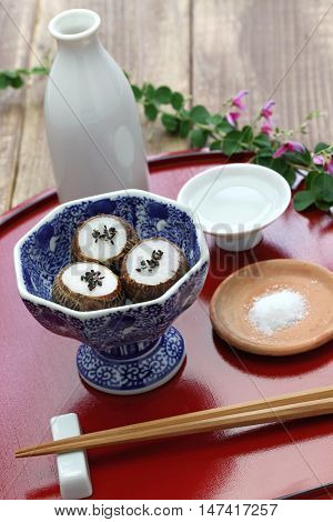 kinukatsugi, steamed small taro, japanese food.
kinukatsugi is a dish which small satoimo taro potatoes are steamed with their skins on and eaten by pealing their skins.
