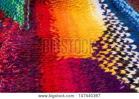 striped colorful wool texture handmade patten closeup macro blue red green yellow  biege purple orange brown