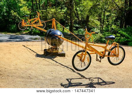 Pedal Powered swinging 'bicycle' roundabout playground eguipment.