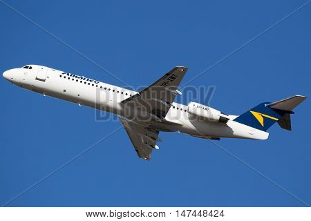 BRISBANE, AUSTRALIA - June 30: An Alliance Fokker 70 aircraft departs Brisbane, Australia, on Thursday 30th June, 2016