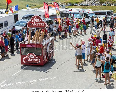 Col du Glandon France - July 23 2015: Banette vehicle during the passing of the Publicity Caravan on Col du Glandon in Alps during the stage 18 of Le Tour de France 2015. Banette is the leading brand for the artisan bread in France.