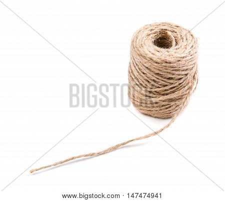 New spool of craft twine on a white background isolated