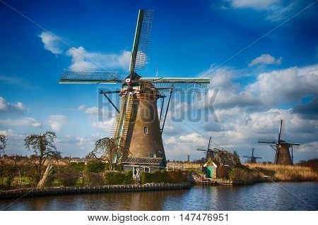 Group of windmills in Kindeijk, Netherlands with nice cloudy sky.