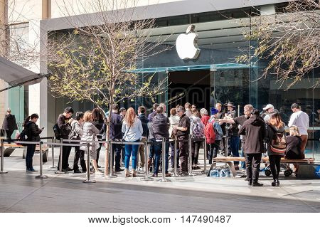 Adelaide Australia - September 16 2016: Customers lined up in the queue during the sales launch of IPhone 7 in front of Apple Store Rundle Mall