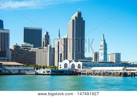 San Francisco USA - September 26 2015: View of the Ferry Buildinbg with the skyscrapers of the Embarcadero Center