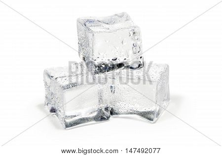 close up of three ice cubes isolated on white background