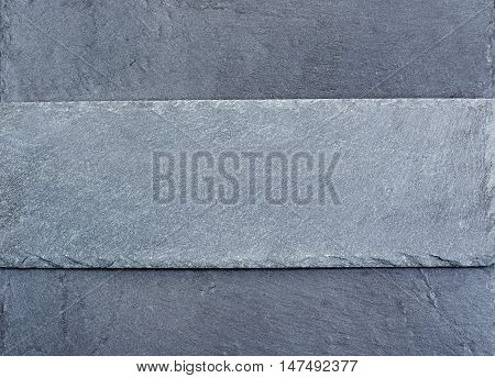 slab of grey slate on slate background