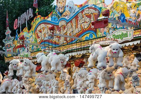 10th September 2016, Bad Dürkheim, Wurstmarkt 2016 (wine festival), Germany: Large showcase (carnival toy stand) with plenty of white teddy bears