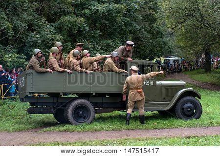 Gatchina, Russia - September 11, 2016: The historical reconstruction of World War II. Truck ZIS-5 - one of the main transport vehicle of the Red Army during the Great Patriotic War. Truck transporting soldiers.