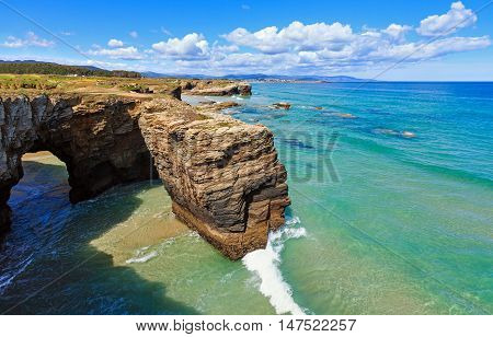 Natural Arches On Beach.