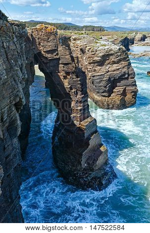 Natural Arches On Beach.