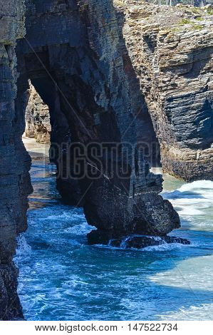Natural Arches On Beach.