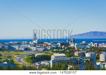 Beautiful Super Wide-angle Aerial View Of Reykjavik, Iceland With Harbor And Skyline Mountains And S