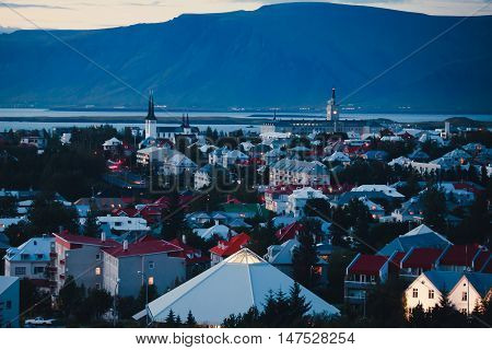 Beautiful Super Wide-angle Aerial View Of Reykjavik, Iceland With Harbor And Skyline Mountains And S