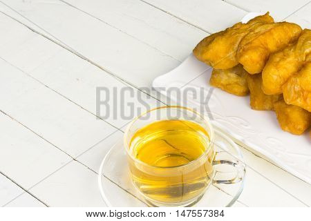 Bread stick or chiness deep fried  or patongko of thai and hot tea.Meal or breakfast of thailand and asia.Close up
