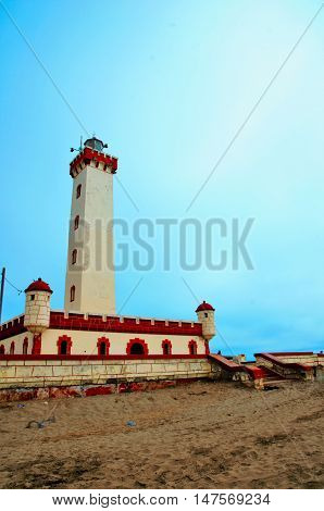 Low angle with of the Lighthouse Monumental La Serena with a sunny blue sky at the beach of La Serena in Chile, South America