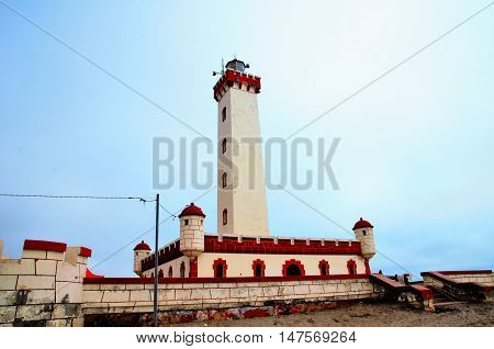 Low angle with of the Lighthouse Monumental La Serena with a sunny blue sky at the beach of La Serena in Chile, South America