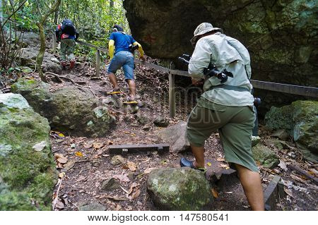 Semporna,Sabah-Sep 10,2016:Group of hikers on hiking trail,trekking in Bohey Dulang,Tun Sakaran Marine Park,Semporna,Sabah,Borneo.It is the most popular island for hiking & climbing activities.