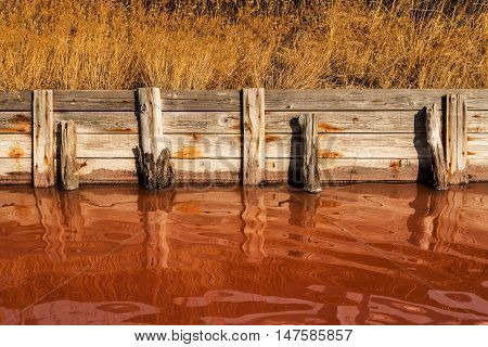 beautiful reflections in the waters of the saltworks -selective focus copy space