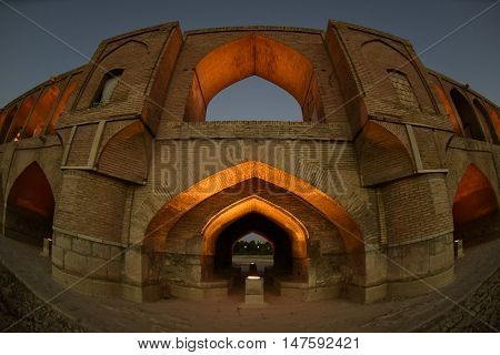 sunset time to historical stone bridge of 33 arches in isfahan, iran at September 15, 2016.