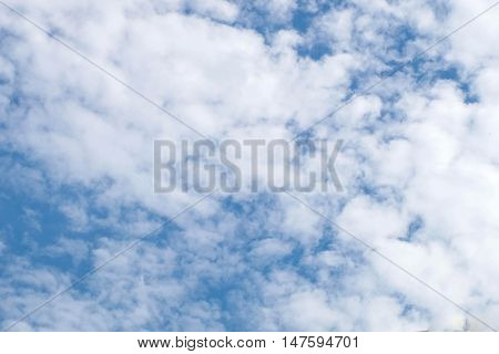 Fantastic soft white clouds against blue sky