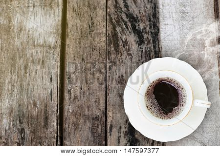 Coffee cup in Morning on old wood background