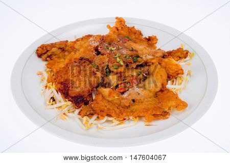 Crisp fried mussel pancakes. Shell fried with vegetables (Hoi Tod)