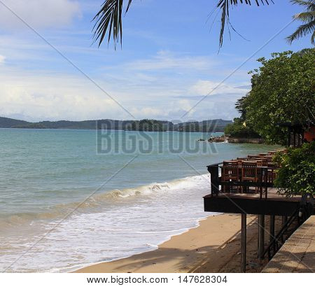 Ao Nung beach, looking out toward the islands, restaurant balcony visible on the right, Thailand