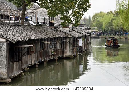 WUZHEN CHINA - MARCH 24: Old Town of Wuzhen on March 24 2016 in Wuzhen China. Wuzhen is a historic scenic town located in northern Zhejiang Province China