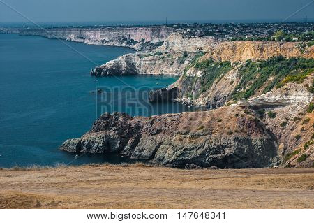 The top view on sea and rocks