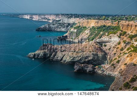 The top view on sea and rocks
