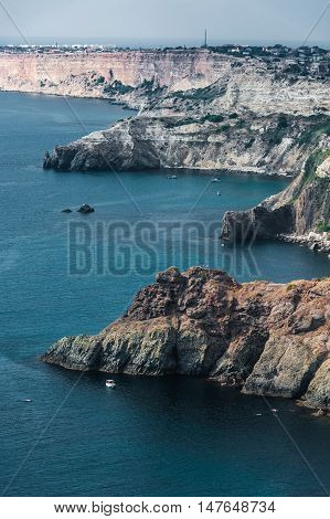 The top view on sea and rocks