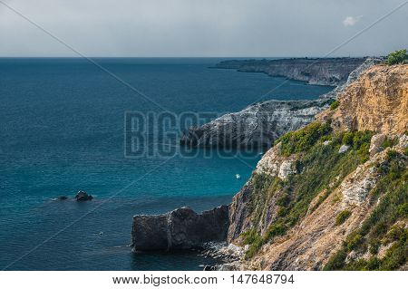 The top view on sea and rocks