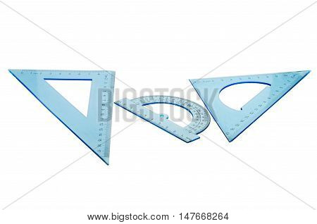 Set of multiple blue plastic rulers and the protractor isolated over the white background