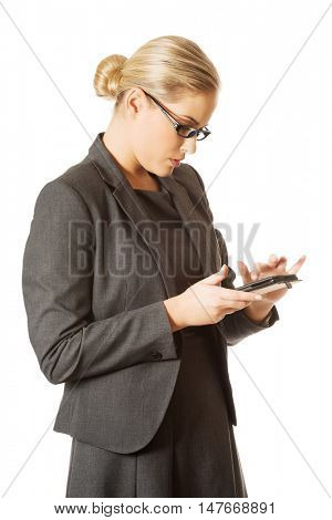 Businesswoman sending a message